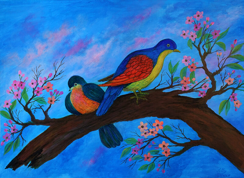 Two coloured birds on a branch of blossoms in a blue background