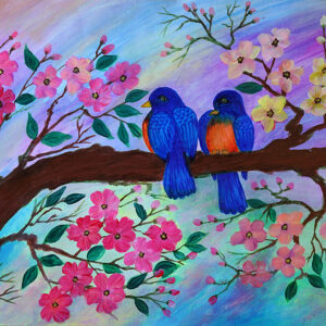 Two coloured birds on a branch of blossoms in a rainbow background